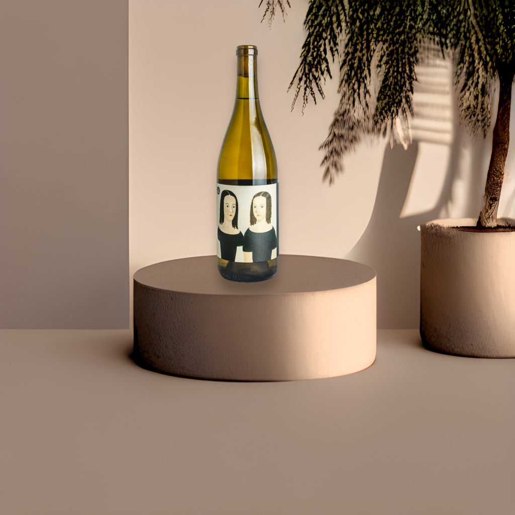 A picture of a white wine bottle on a grey stand against a grey background and a plant in the background.