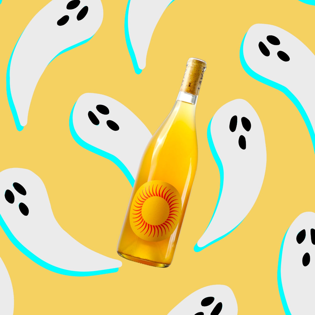 Bottle or Wavy Wines Orange Wine suspended in the air with an artistic yellow background of white ghosts, for Halloween theme.