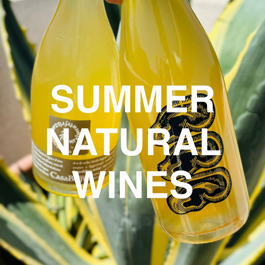 Summer Natural Wines Collection - Clicking here will take you to our carefully curated collection of natural wines perfect for the summer.  The photo depicts two natural orange and sparkling wines perfect for summer.